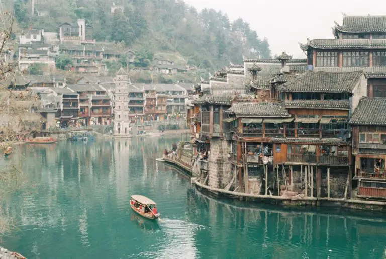 A boat trip through an old, picturesque Chinese village in Xianxi District, Hunan Province